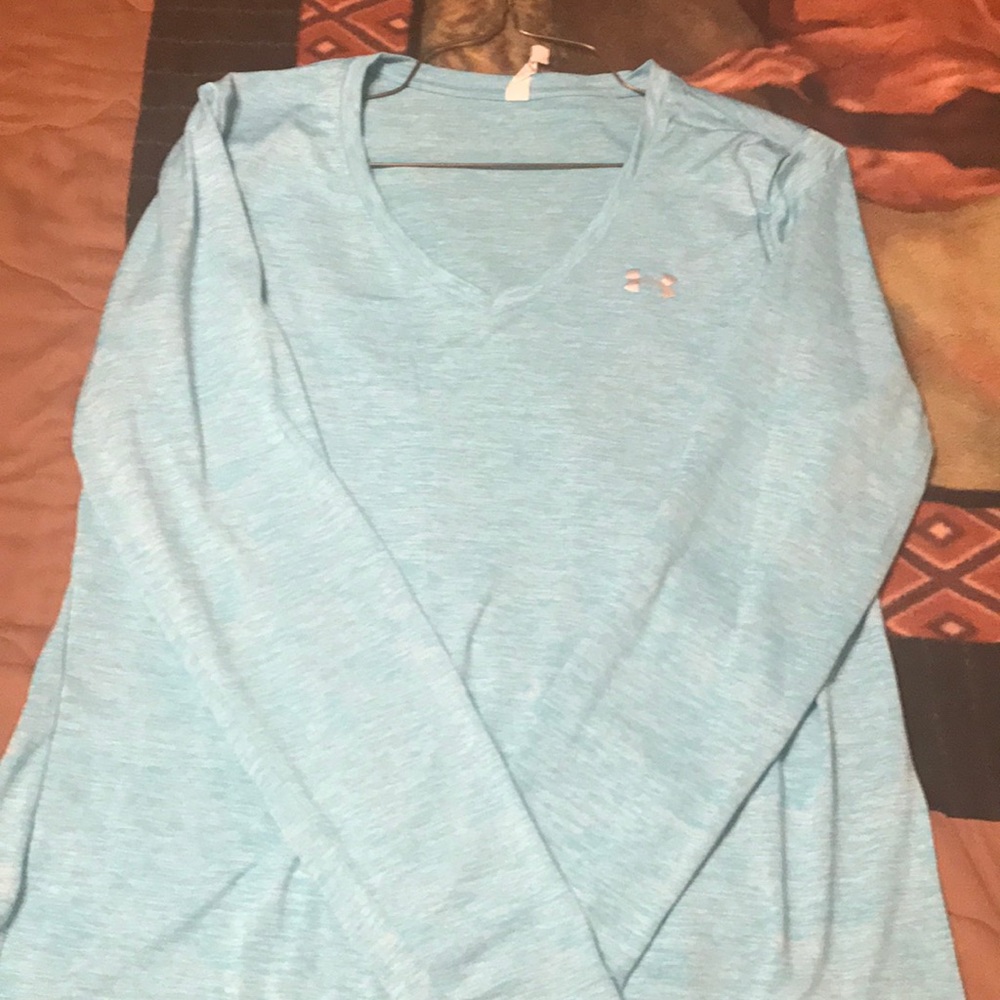 Blue women's Under Armour Heat Gear top